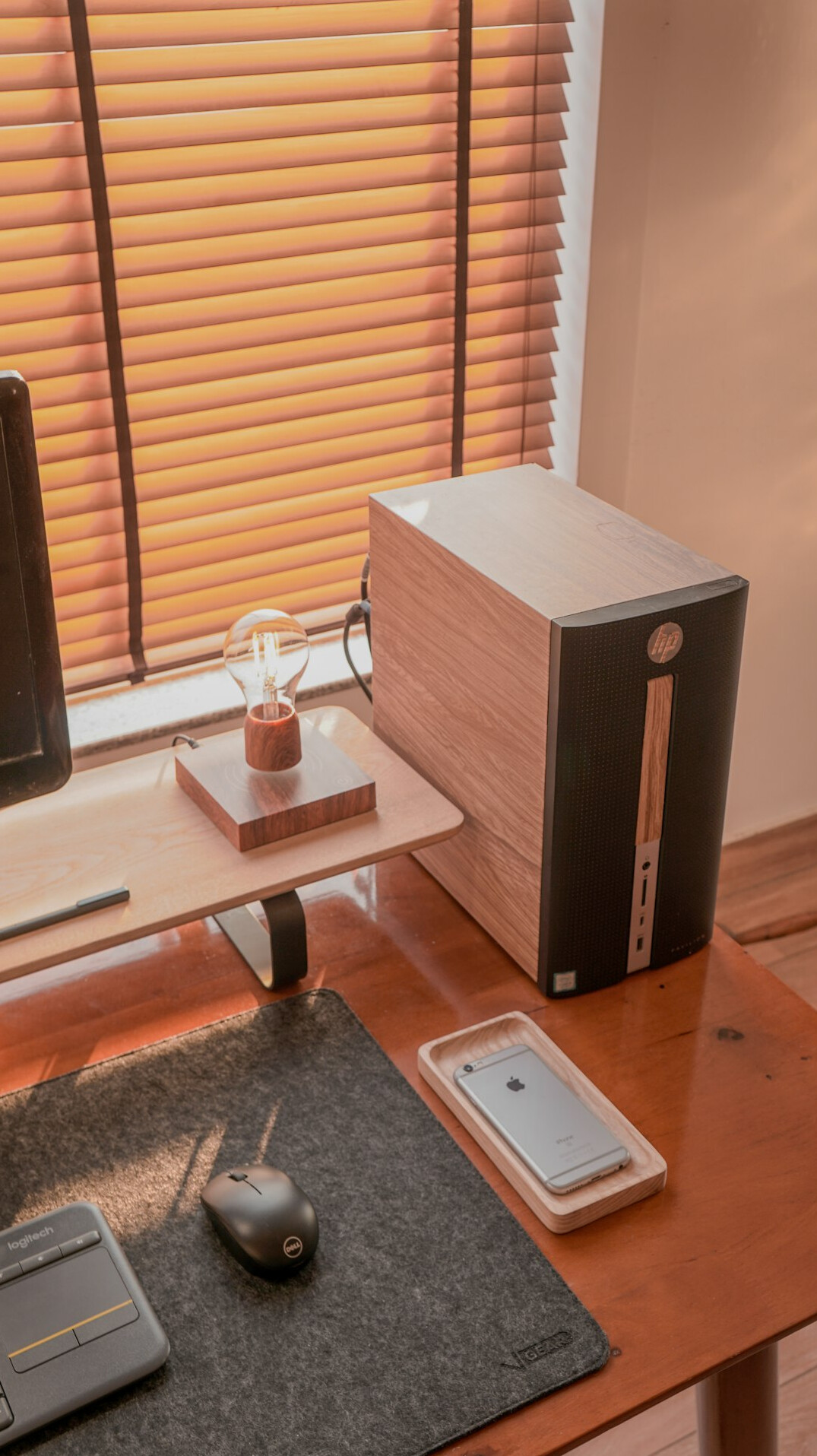 Modern office desk with a computer, notebook and insurance documents